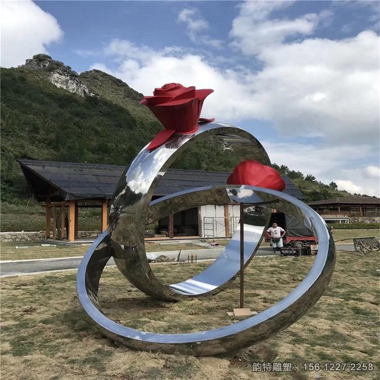 不銹鋼結(jié)婚戒指雕塑,玫瑰花戒指雕塑制作廠家 不銹鋼結(jié)婚戒指雕塑,玫瑰花戒指雕塑制作廠家